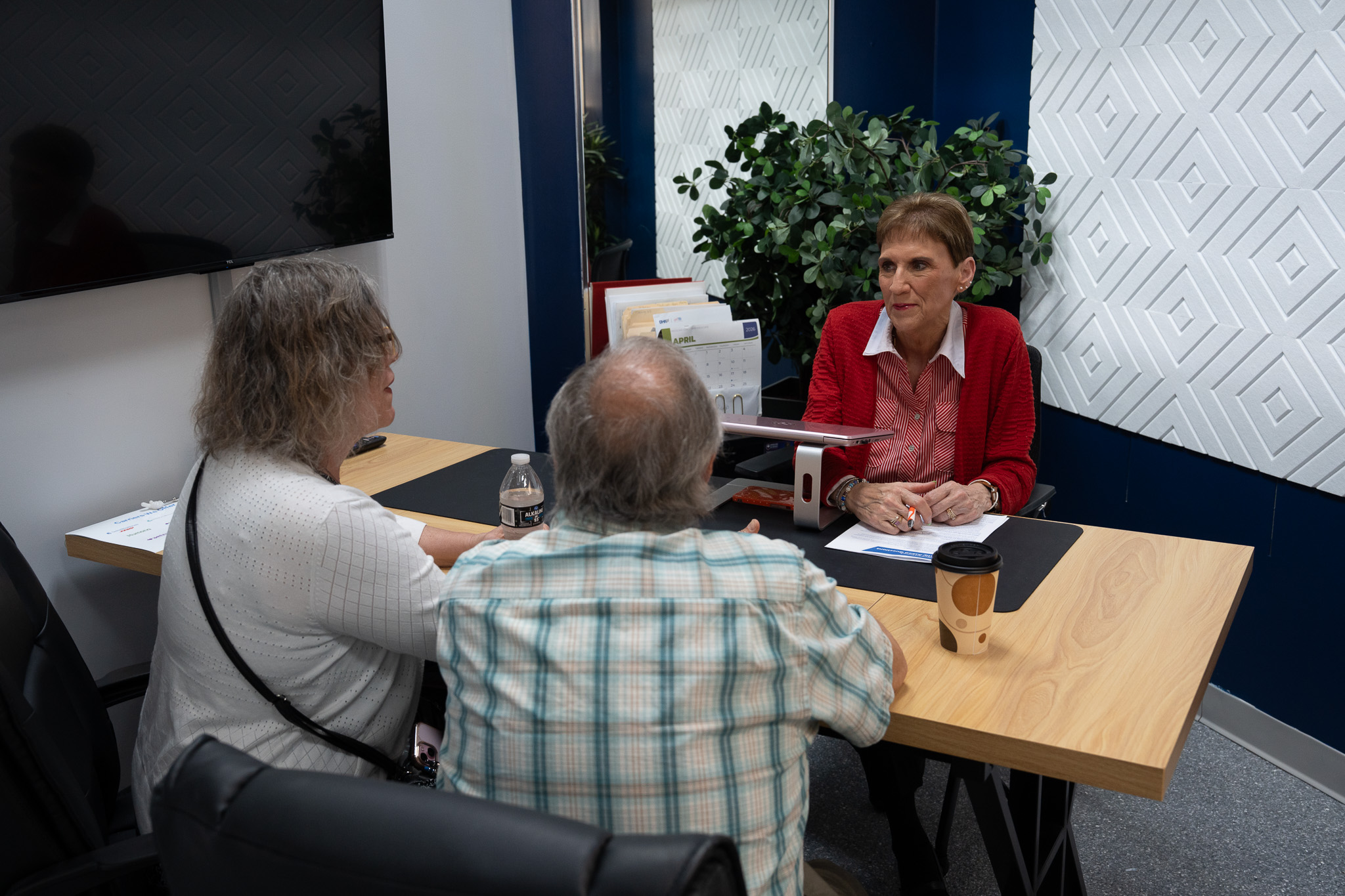 Licensed Medicare advisor meeting with clients in Beavercreek, Ohio to review enrollment options
