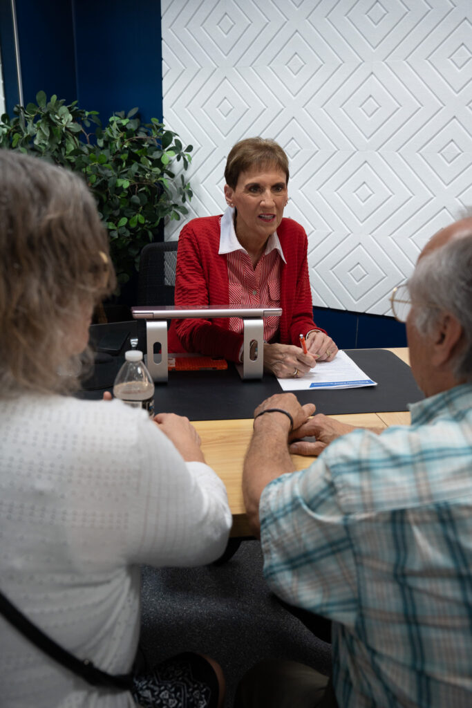 Medicare and Retirement Solutions Group advisor reviewing plan options with clients in Dayton, Ohio